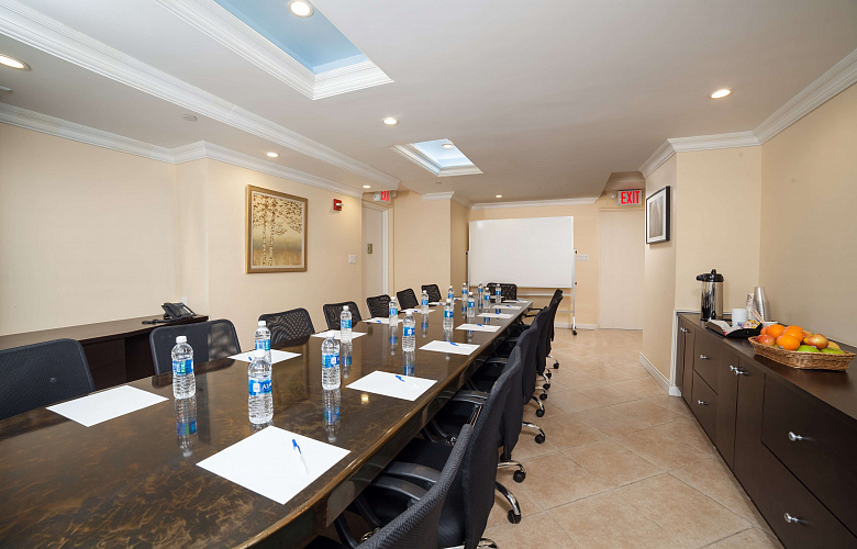 Photo 1 of Private Conference Room that can accommodate up to 15 people with amenities, such as whiteboard, phone, coffee/tea/water and Wifi. 